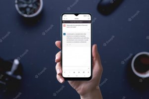 Artificial intelligence chat app on phone display in hand